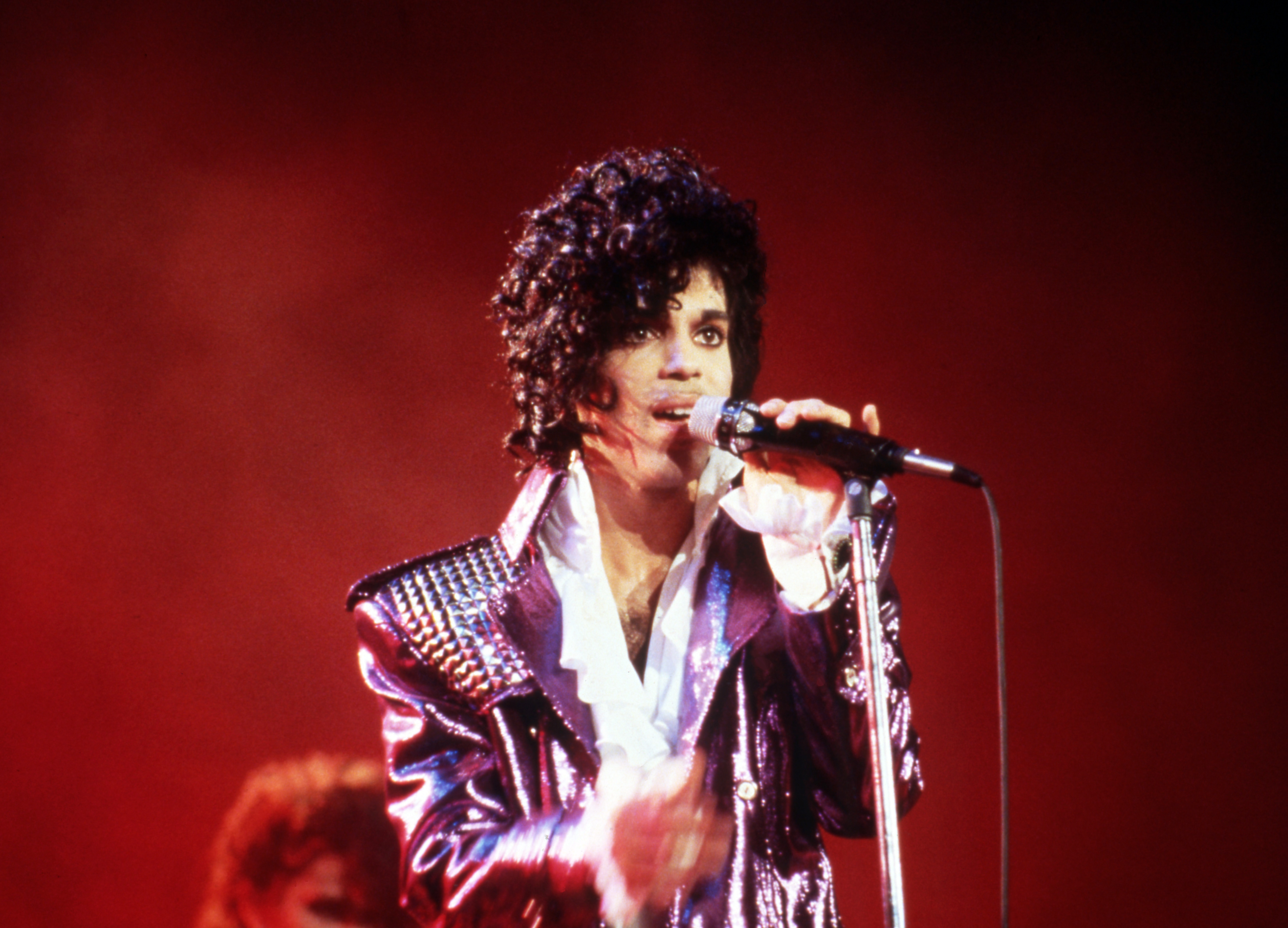 Prince performs onstage during the 1984 Purple Rain Tour on November 4, 1984, in Detroit, Michigan | Source: Getty Images