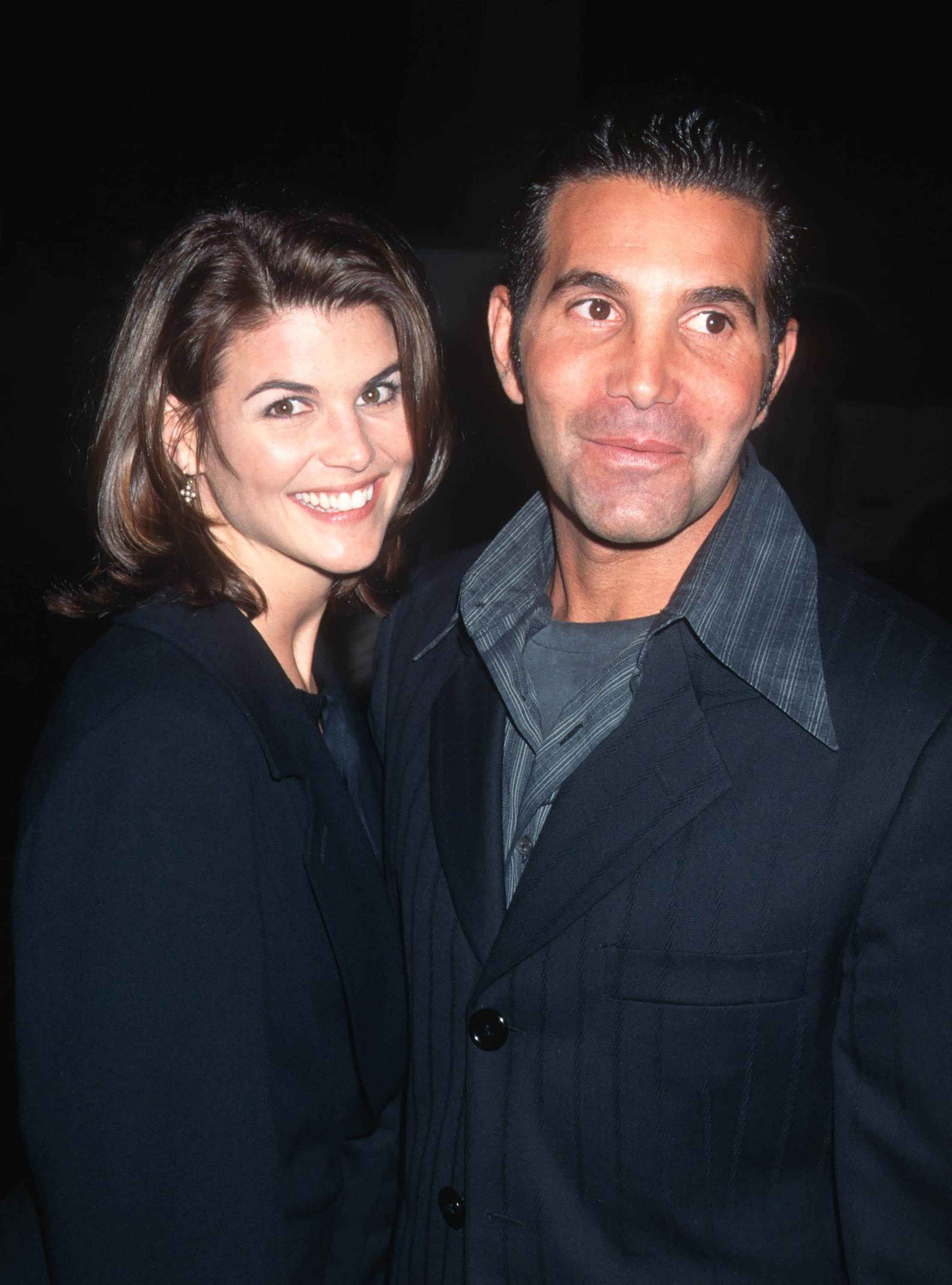 Lori Loughlin and Mossimo Giannulli attend the GQ Magazine Cocktail Party Honoring Peter Bart at the Beverly Hills Hotel on December 12, 1995 in California. | Source: Getty Images