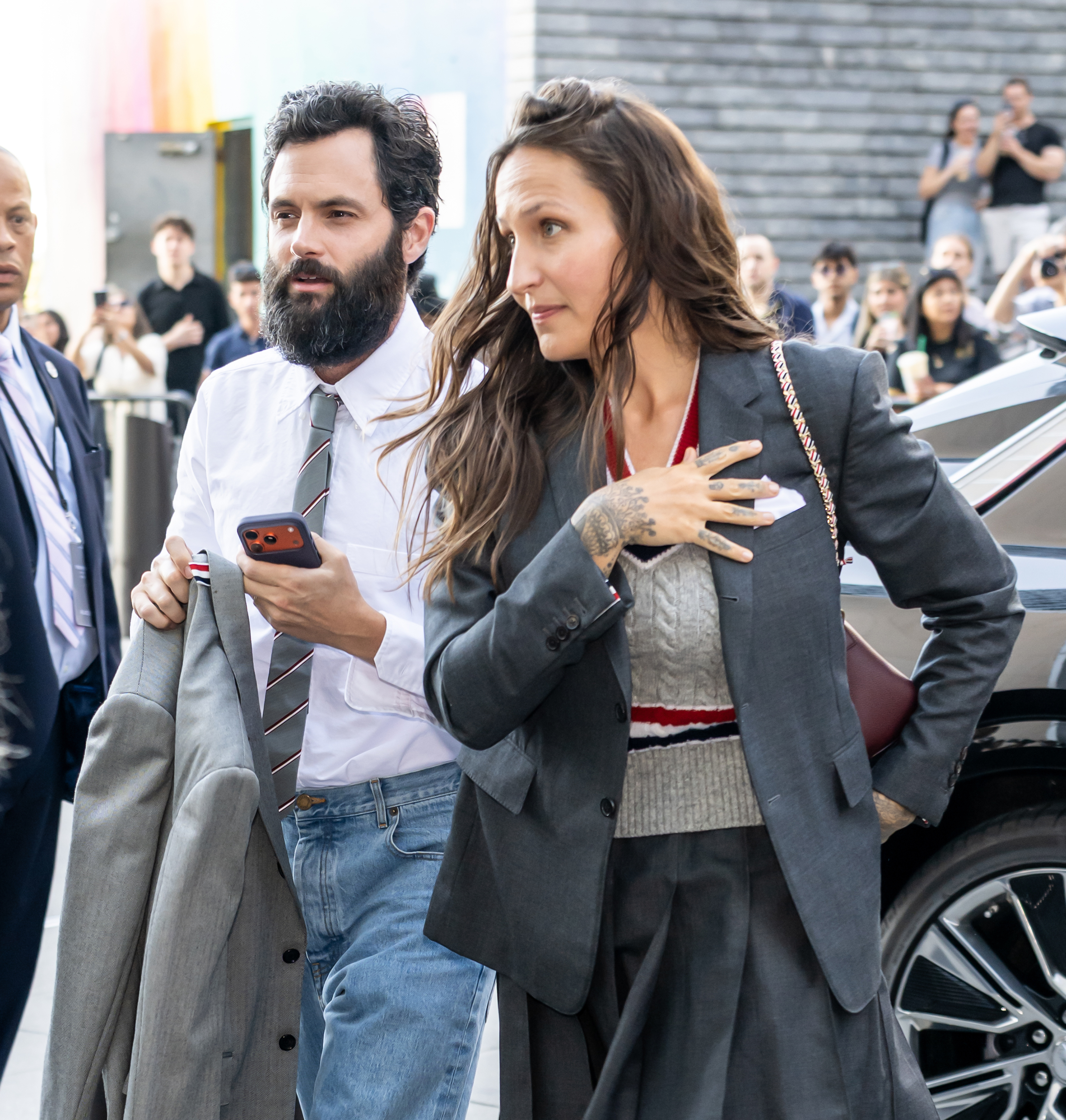Penn Badgley and Domino Kirke attend the Thom Browne Spring/Summer 2027 fashion show at The Shed at Hudson Yards on September 15, 2026 in New York City. | Source: Getty Images